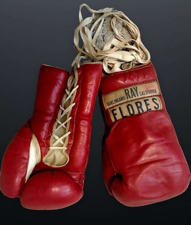 Red FLORES gloves carrying the RAY FLORES Burlingame California cuff label.