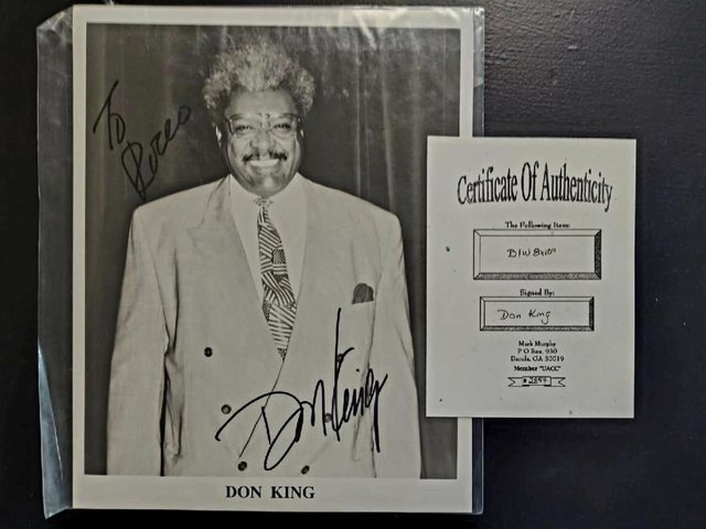 Signed photograph of the promoter Don King, displayed with its certificate of authenticity.